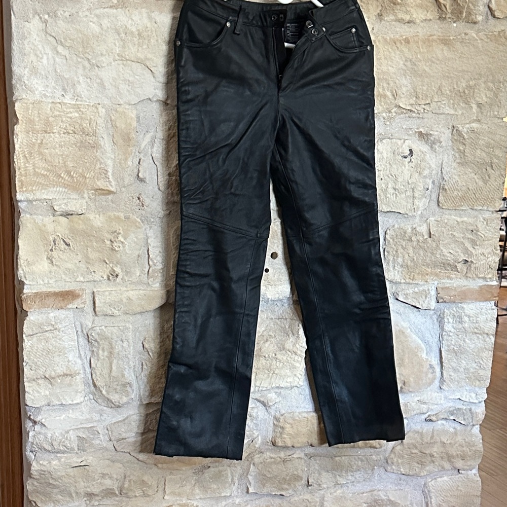 Harley-Davidson Black Leather Pants
Zipper to waist & snaps at the bottom of leg